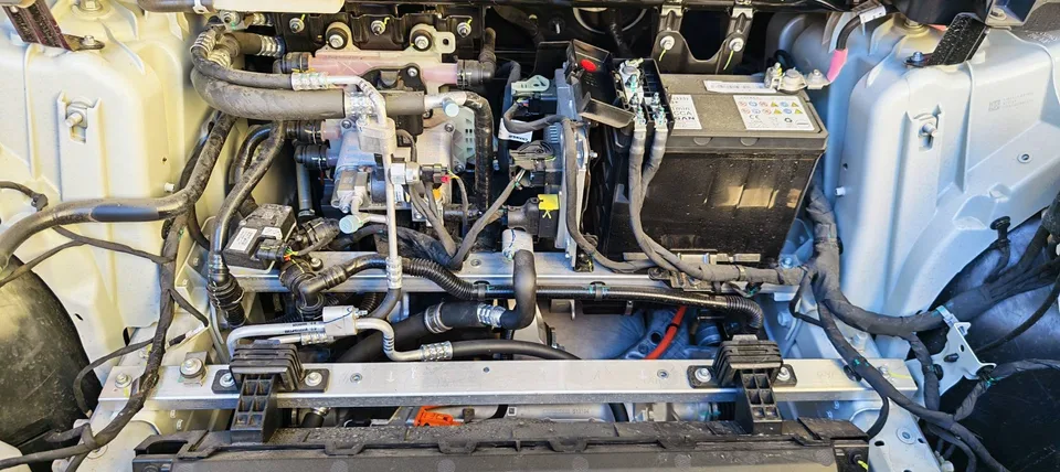 Front compartment with the liner removed; the 12V battery is at the upper right of the photo